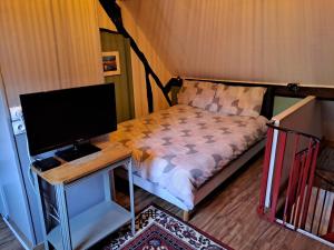 Postel nebo postele na pokoji v ubytování Chez Robins