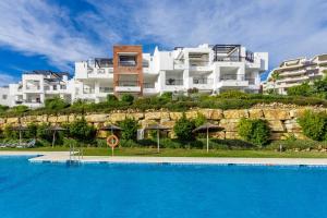 Bazén v ubytování Los Robles de Los Arqueros golf 3 bedrooms apartment. nebo v jeho okolí