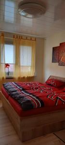 Ένα ή περισσότερα κρεβάτια σε δωμάτιο στο Apartment mit Herz