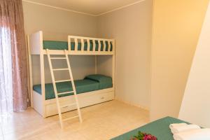 Postel nebo postele na pokoji v ubytování B&B al Vico Pepe