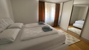 Ένα ή περισσότερα κρεβάτια σε δωμάτιο στο Stara Čaršija apartman