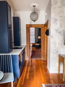 a living room with a table and a dining room at The Matriarch- Downtown Ashland, OR in Ashland