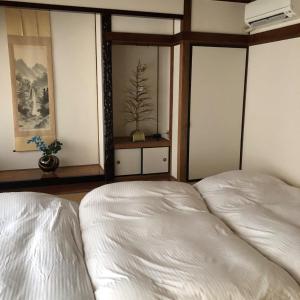 A bed or beds in a room at Ogi - House - Vacation STAY 33925v