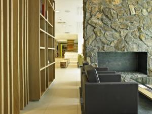 Telewizja i/lub zestaw kina domowego w obiekcie Reykjavik Natura - Berjaya Iceland Hotels