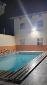 an empty swimming pool in a building at Hotel Itatiaia in São Luís