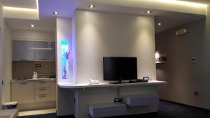 TV a/nebo společenská místnost v ubytování Apartments M Palace