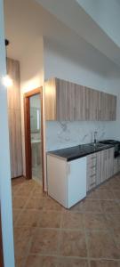 a kitchen with a sink and a counter top at Chrysiis House 1 in Maltezana