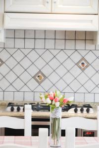 A kitchen or kitchenette at Il Mosaico Al Mare