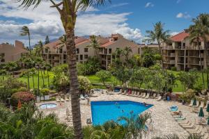 an aerial view of the resort with a pool and palm trees at 4-309 Kamaole Sands**Newly Remodeled** Steps to Kamaole 3 Beach! in Wailea