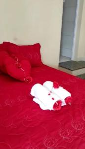 Łóżko lub łóżka w pokoju w obiekcie Pousada Três Praias