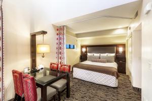 Voodi või voodid majutusasutuse Scottsdale Camelback Resort toas