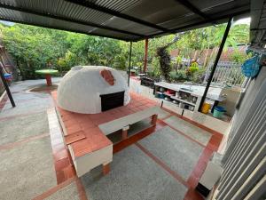 a bench sitting on top of a patio at villa vale Rivera Huila in Rivera