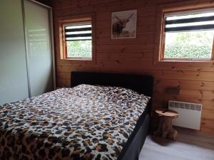 Postel nebo postele na pokoji v ubytování Holiday Home Hulshorst near Dolfinarium