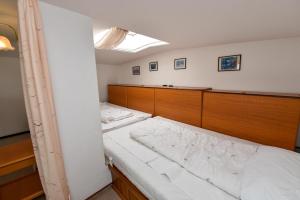 Ein Bett oder Betten in einem Zimmer der Unterkunft Haus "Jan am Strand" Appartement JAN504