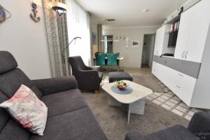 Posezení v ubytování Appartementhaus "Pavillon" Appartement PAV02