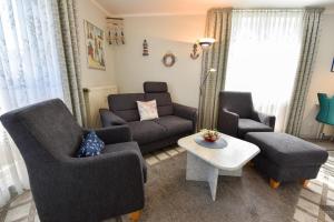 Posezení v ubytování Appartementhaus "Pavillon" Appartement PAV02