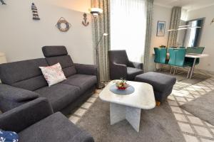 Posezení v ubytování Appartementhaus "Pavillon" Appartement PAV02