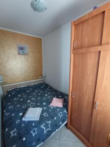 Postel nebo postele na pokoji v ubytování Apartment Zlatko