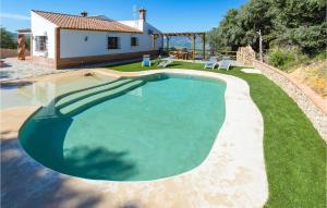 The swimming pool at or close to 3 Bedroom Amazing Home In El Gastor