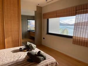 Posteľ alebo postele v izbe v ubytovaní Elounda Gulf Sunrise Villa