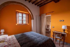 Llit o llits en una habitació de Casetta rustica nel Chianti