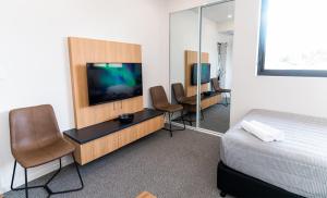 TV a/nebo společenská místnost v ubytování Kastro Apartments