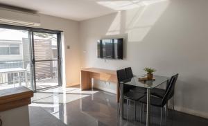 TV a/nebo společenská místnost v ubytování Cardiff Executive Apartments