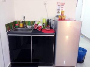 Kuchyň nebo kuchyňský kout v ubytování Homestay Menara U MSU