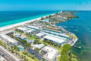 an aerial view of a resort next to the ocean at Anna Maria Island Beach Sands 201 in Bradenton Beach