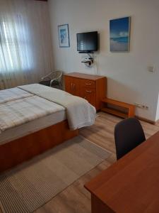 Postel nebo postele na pokoji v ubytování Olivia