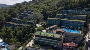 an overhead view of a building with a swimming pool at The Senses Resort & Pool Villas - SHA Plus in Patong Beach