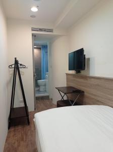 TV o dispositivi per l'intrattenimento presso Meworld Hotel - Daan