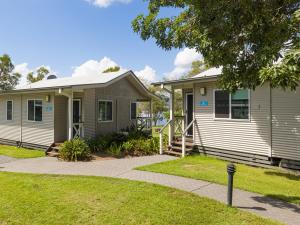 a home in a subdivision with a house at NRMA Lake Somerset Holiday Park in Kilcoy