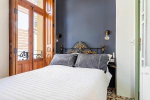 Posteľ alebo postele v izbe v ubytovaní Casa Rosario Cabanyal flat near the beach, high end