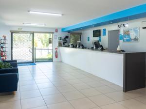 a lobby of a hospital with a reception counter at NRMA Lake Somerset Holiday Park in Kilcoy