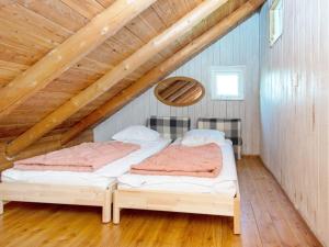 Postel nebo postele na pokoji v ubytování Holiday home Hovborg XI