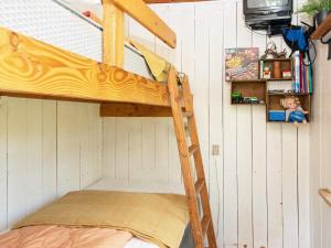 Postel nebo postele na pokoji v ubytování Holiday home Hovborg XI