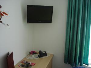 TV a/nebo společenská místnost v ubytování Hotel Bierstübl