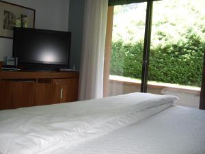 Postel nebo postele na pokoji v ubytování Hotel Canturio