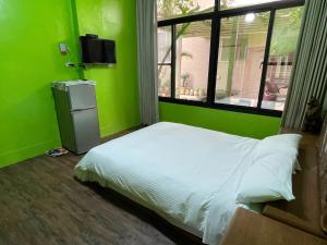 Llit o llits en una habitació de Chunfa B&B