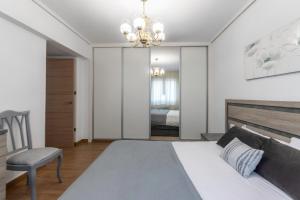 Łóżko lub łóżka w pokoju w obiekcie Amplio y Luminoso en Leioa