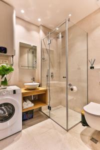 Kylpyhuone majoituspaikassa Royal Residence Apartment