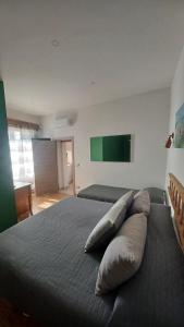 Posteľ alebo postele v izbe v ubytovaní B&B Le Vie del Borgo