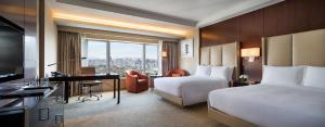 Postel nebo postele na pokoji v ubytování JW Marriott Hotel Beijing Central + 37 fotografií