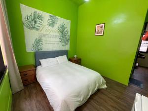 Llit o llits en una habitació de Chunfa B&B