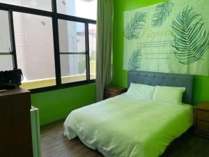 Llit o llits en una habitació de Chunfa B&B