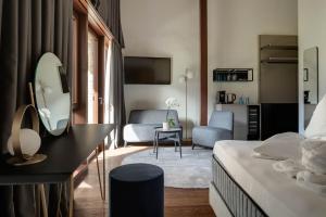 Posteľ alebo postele v izbe v ubytovaní Ansitz Battisti Suites