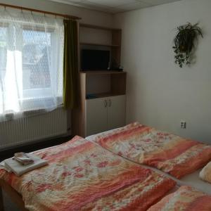 Postel nebo postele na pokoji v ubytování Ubytování Lumik