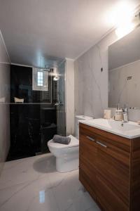 Ванная комната в “Athens Cosmos” Apartment in Neos Kosmos