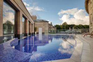 a swimming pool on the side of a building at Ensana Buxton Crescent in Buxton